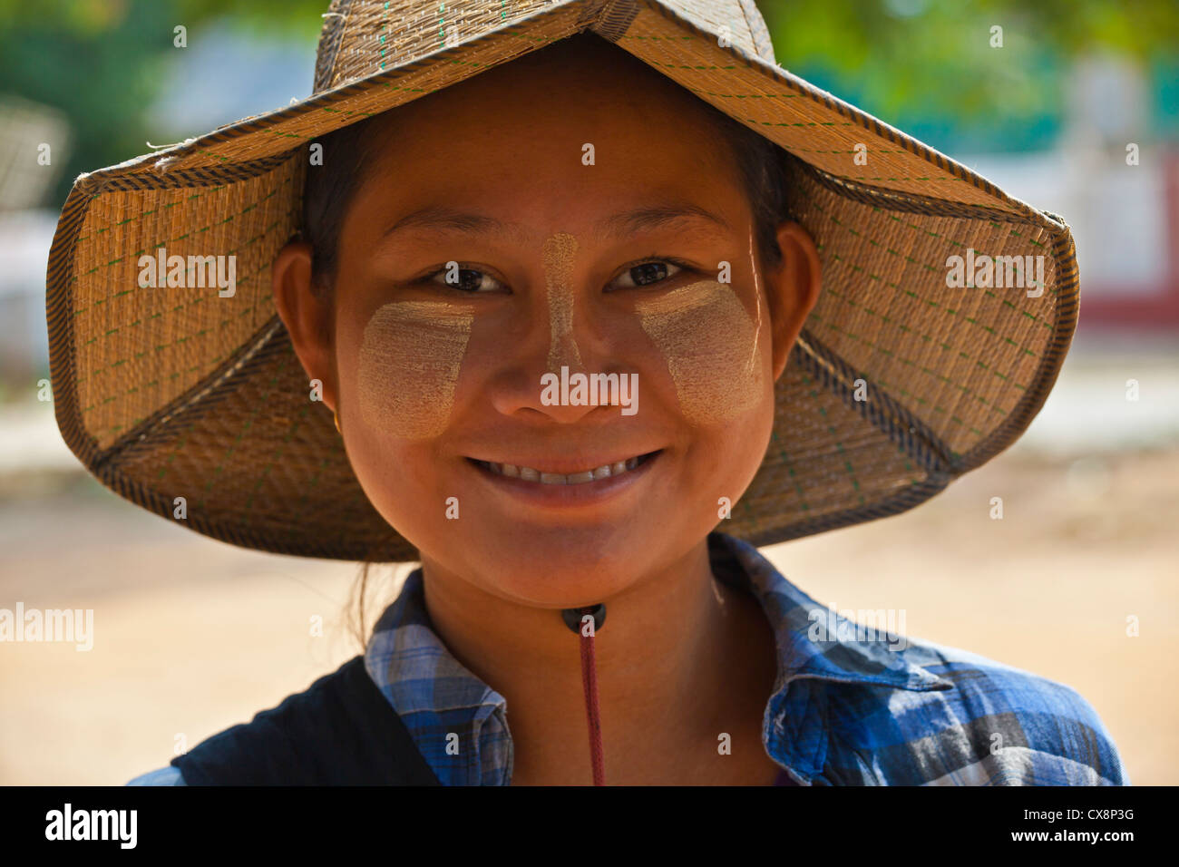 A smiling BURMESE GIRL - MINGUN, MYANMAR Stock Photo