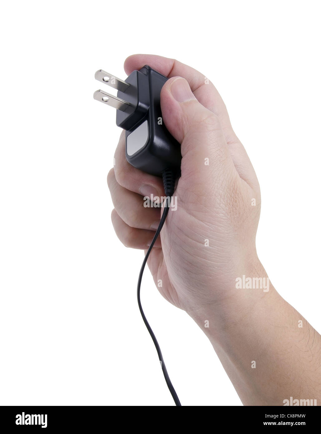 hand holding a power source ready to connect the outlet. Stock Photo