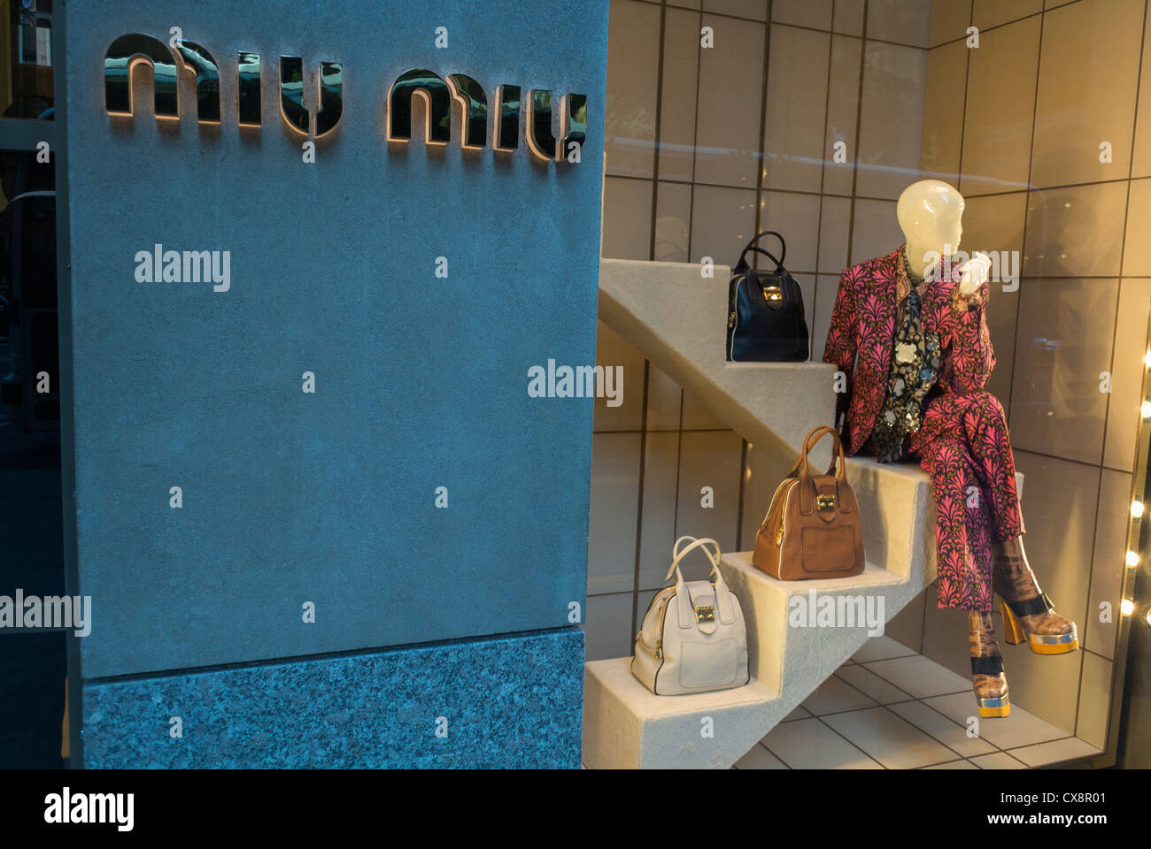 New York, NY, USA, Shopping, sign, Luxury Shops, 'Miu Miu' French Fashion Designer SHop Front Window, on 57th st., Manhattan , fashion clothes shop name, mannequins, retail display Stock Photo