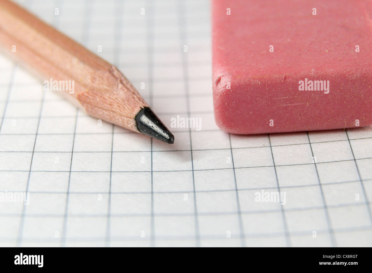 pencil and eraser on the note closeup shot Stock Photo Alamy