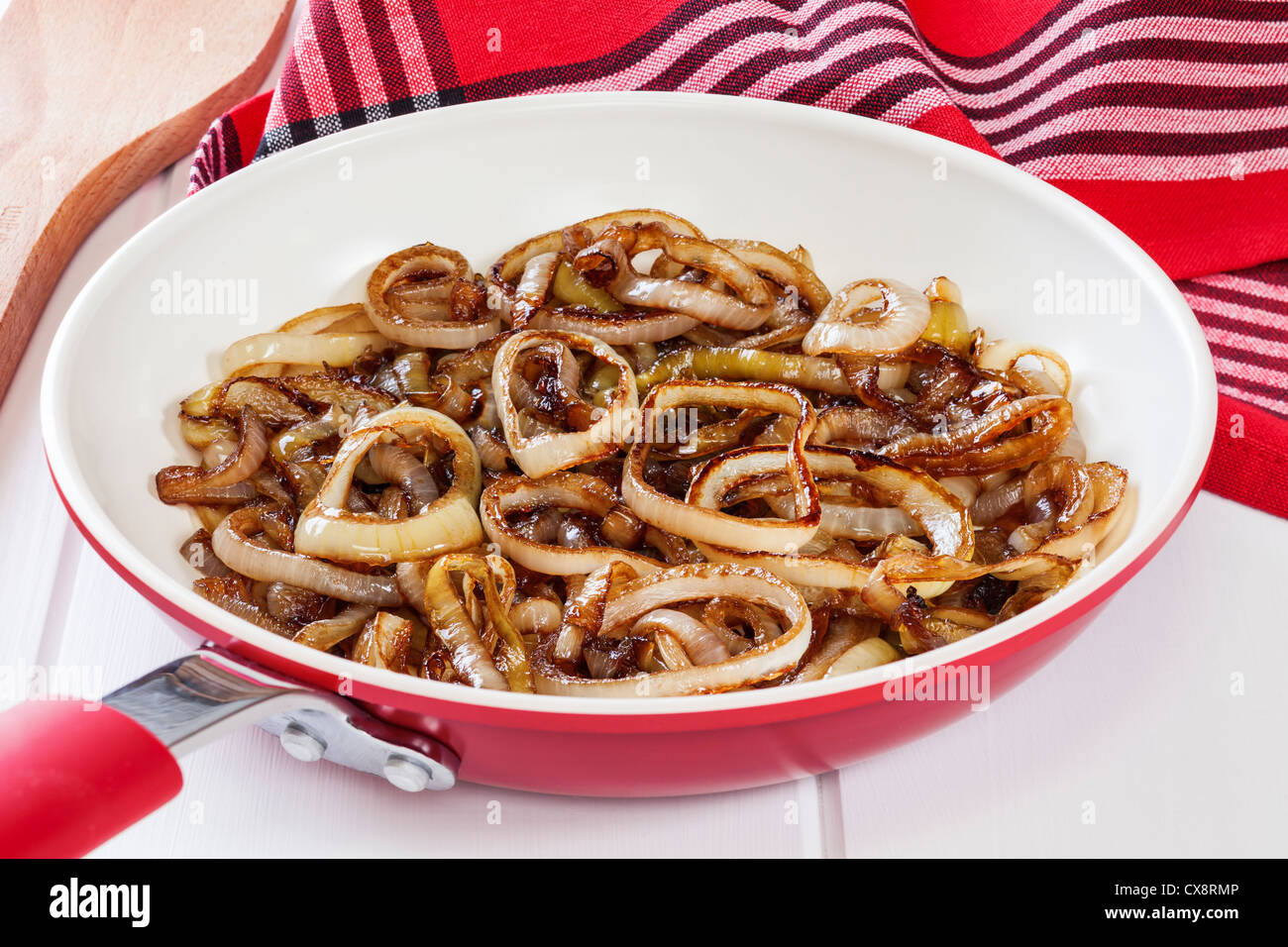 Caramelised onions, cooked with balsamic vinegar and brown sugar. Stock Photo