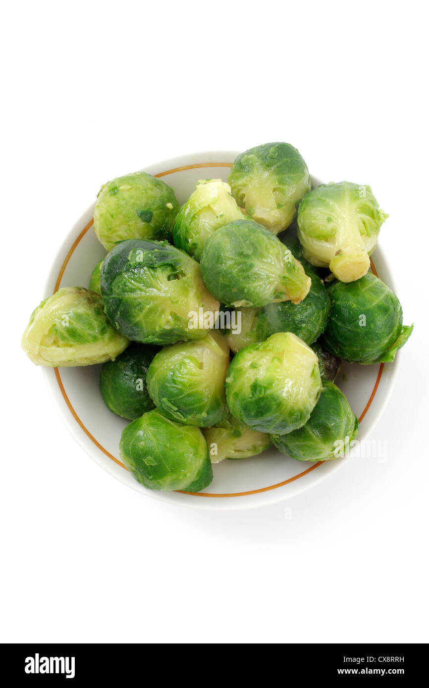 roasted brussels sprouts on a white plate, studio isolated Stock Photo