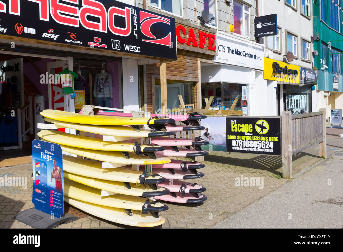 Surfboards outside a surfing shop in Newquay Cornwall England Uk Stock