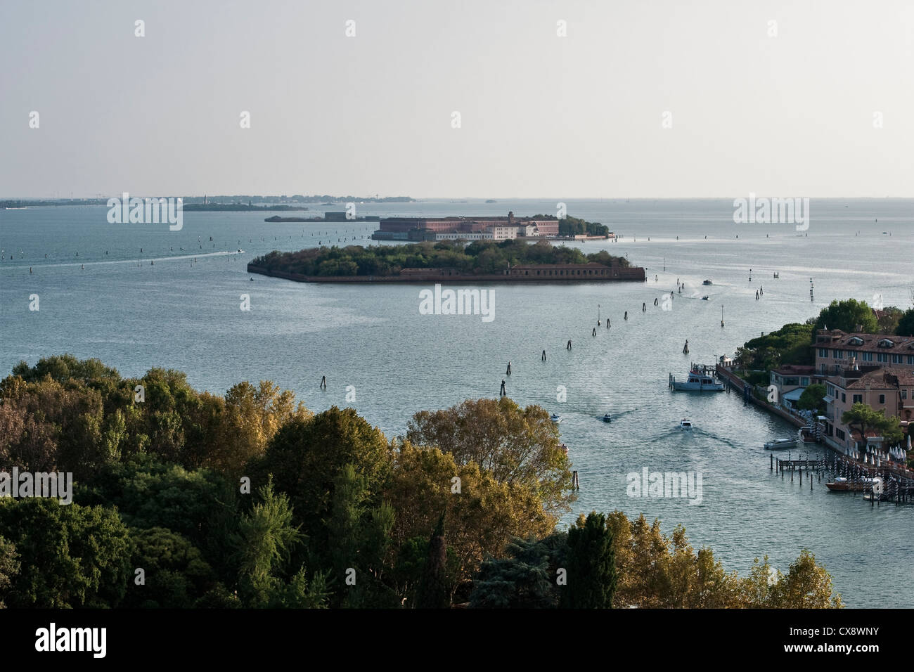 View from the campanile (bell tower) over the cloisters of the 16c church of San Giorgio Maggiore in Venice, Italy, to the island of San Clemente Stock Photo