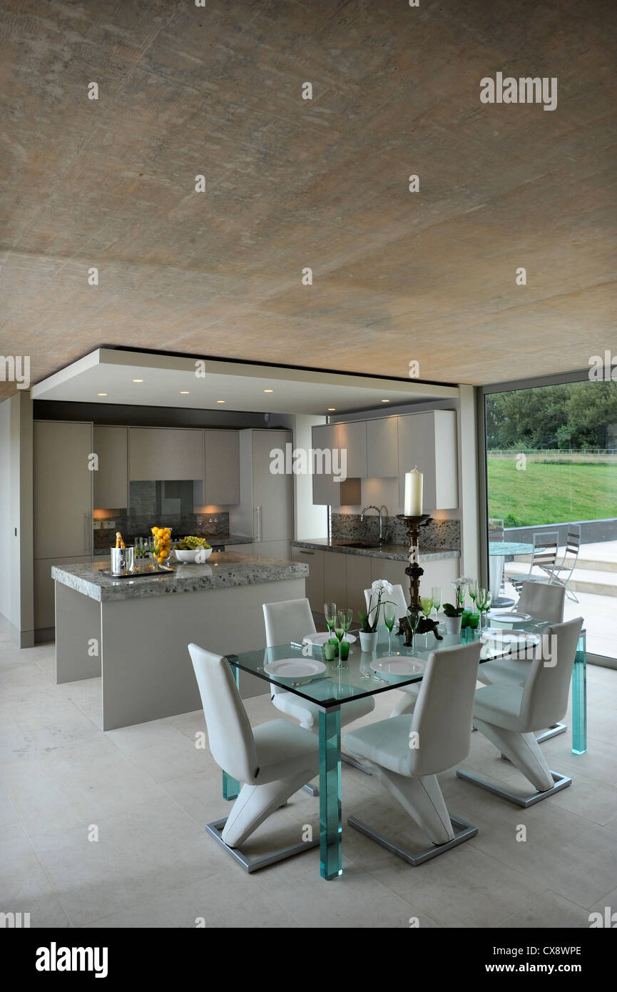 Kitchen dining area of the Round Tower, a property development near Cirencester incorporating modern underground living space, s Stock Photo
