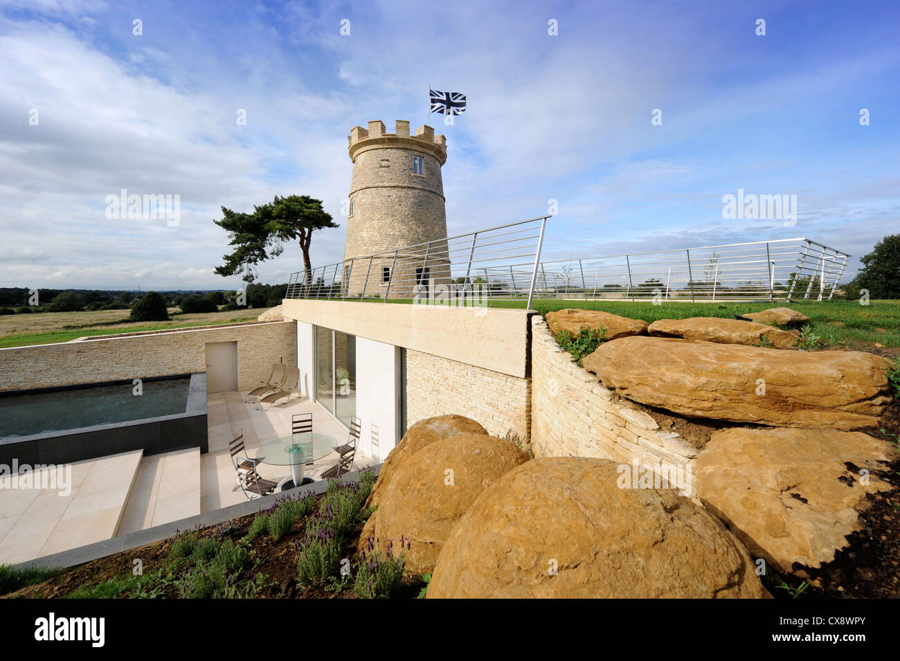 The Round Tower, a property development near Cirencester incorporating modern underground living space, swimming pool and an exi Stock Photo