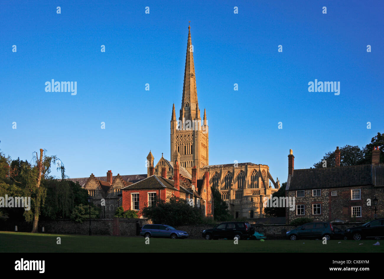 An early morning view of the Cathedral from Lower Close at Norwich, Norfolk, England, United Kingdom. Stock Photo