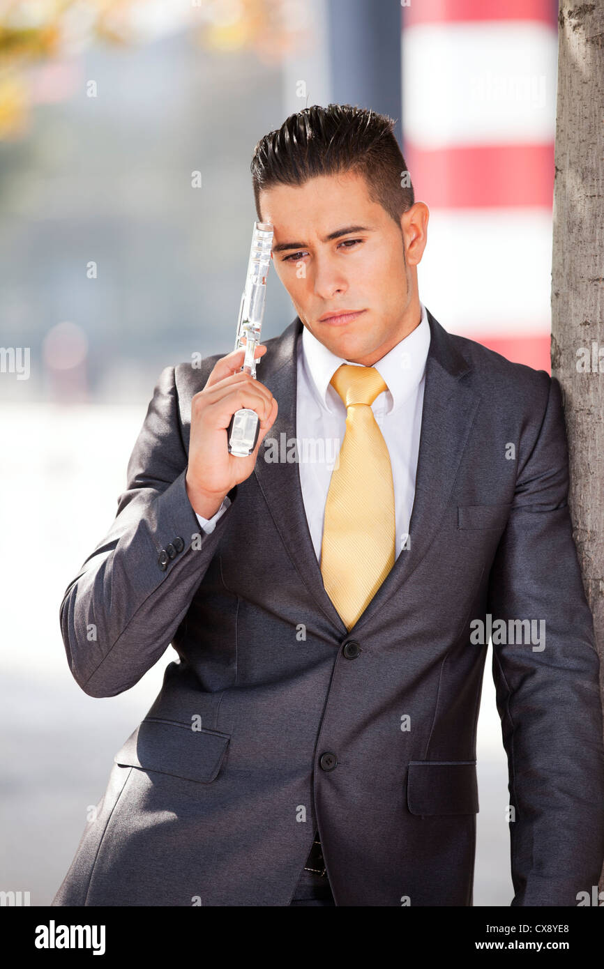 Gun pointing at his head hires stock photography and images Alamy