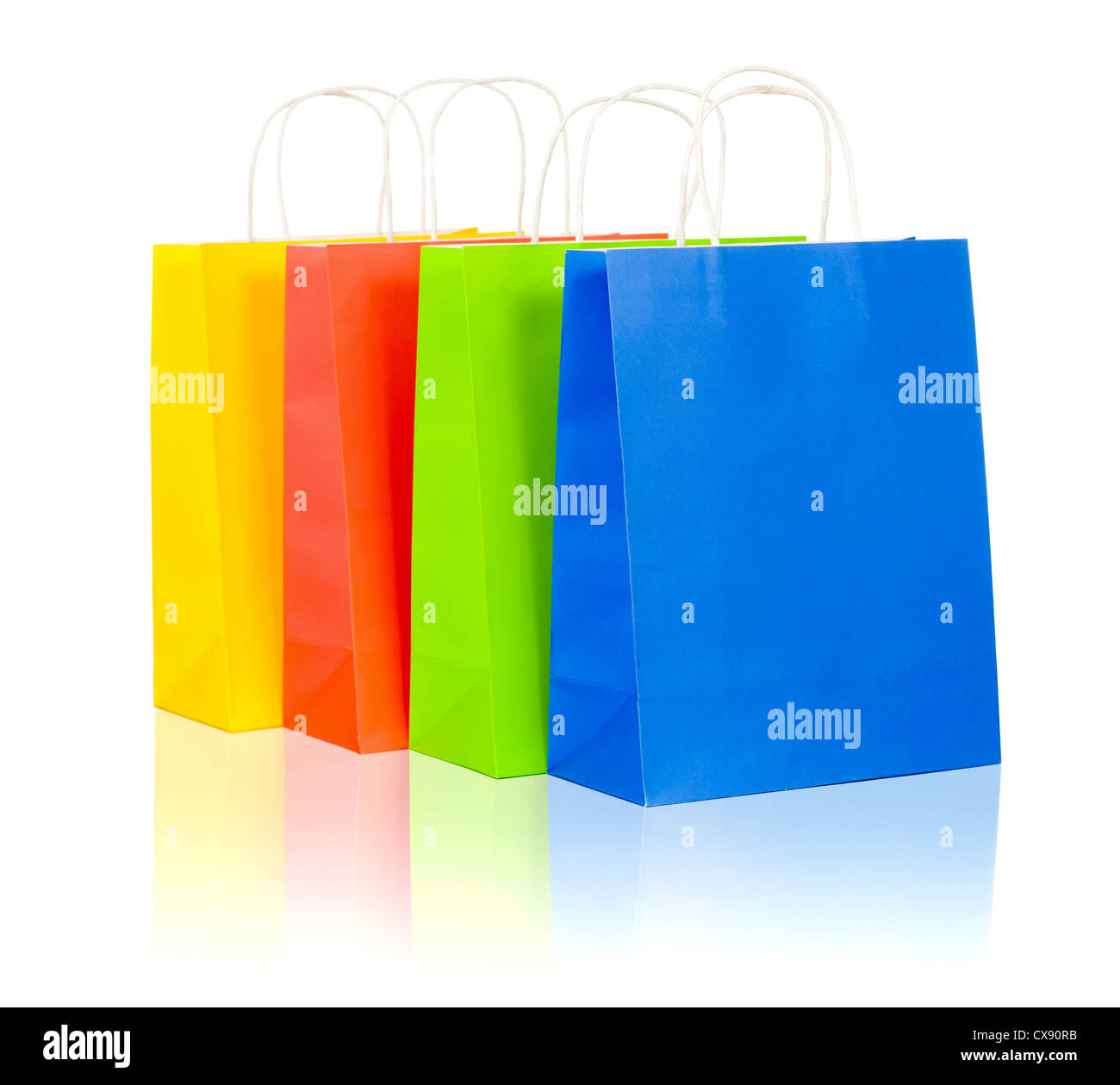 colorful shopping bags set including red, yellow, blue and green on white background Stock Photo