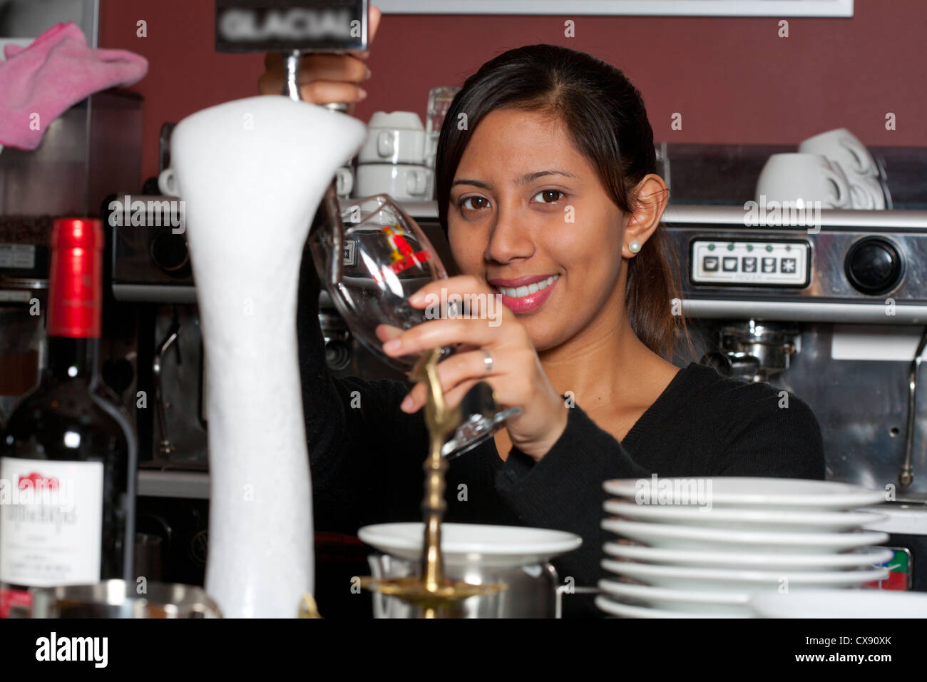 waitress pours draft beer, Café, Southern Spain Stock Photo