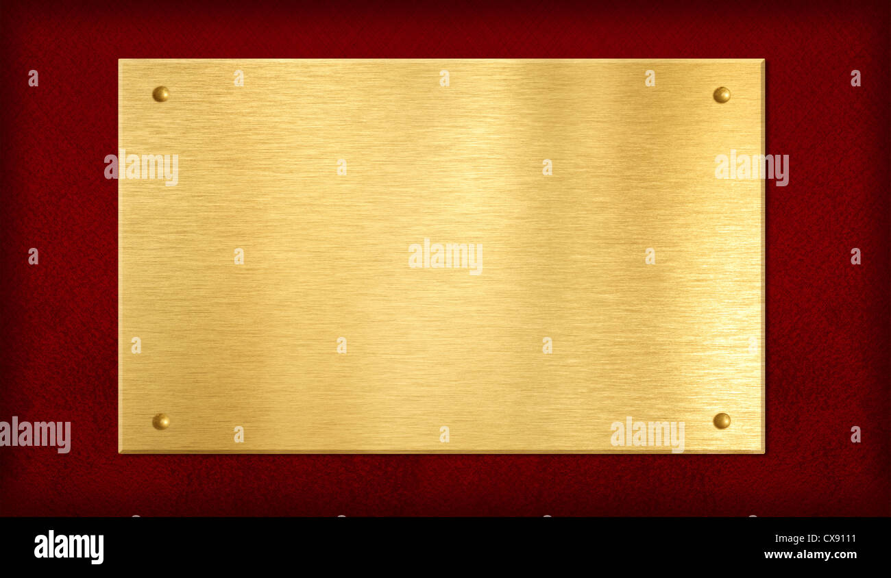 gold plate or plaque on red background Stock Photo