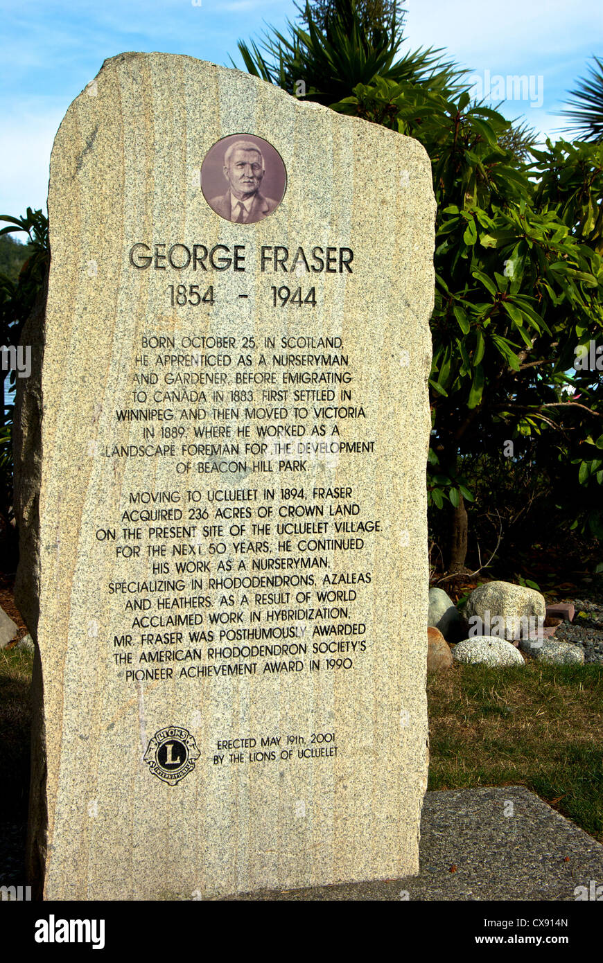 Lions Club granite monument commemorating nurseryman gardener George Fraser Ucluelet waterfront park Stock Photo
