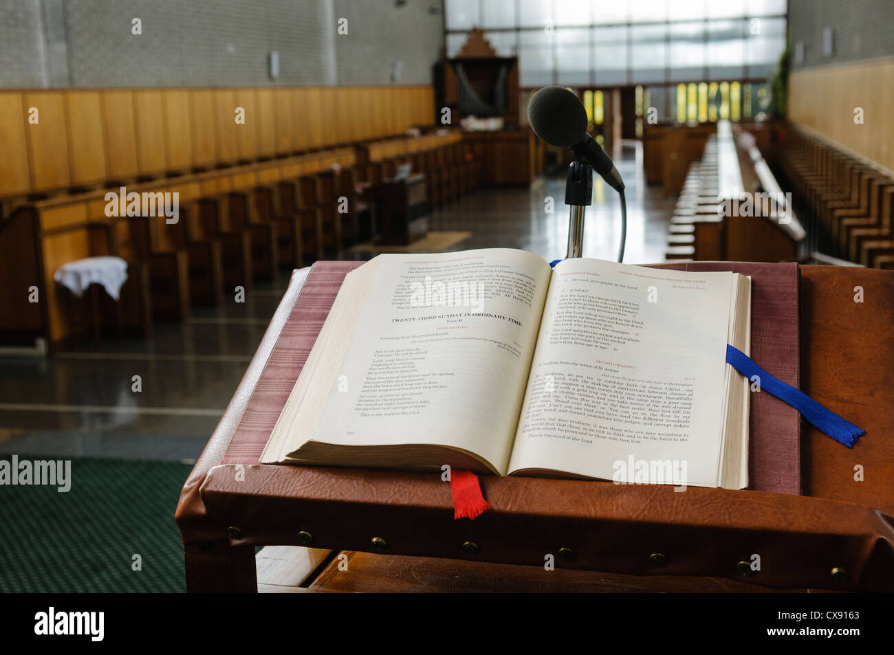 Church service book opened at the page for the 23rd Sunday in a monastery Stock Photo