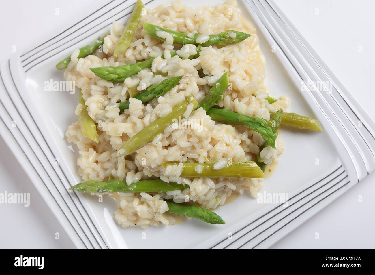 A plate of homemade asparagus risotto made with arborio rice, onion