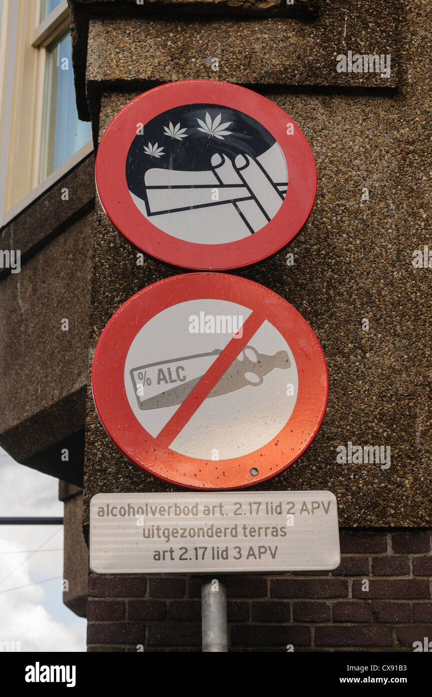 Signs in Amsterdam warning against smoking cannabis and drinking alcohol in public Stock Photo