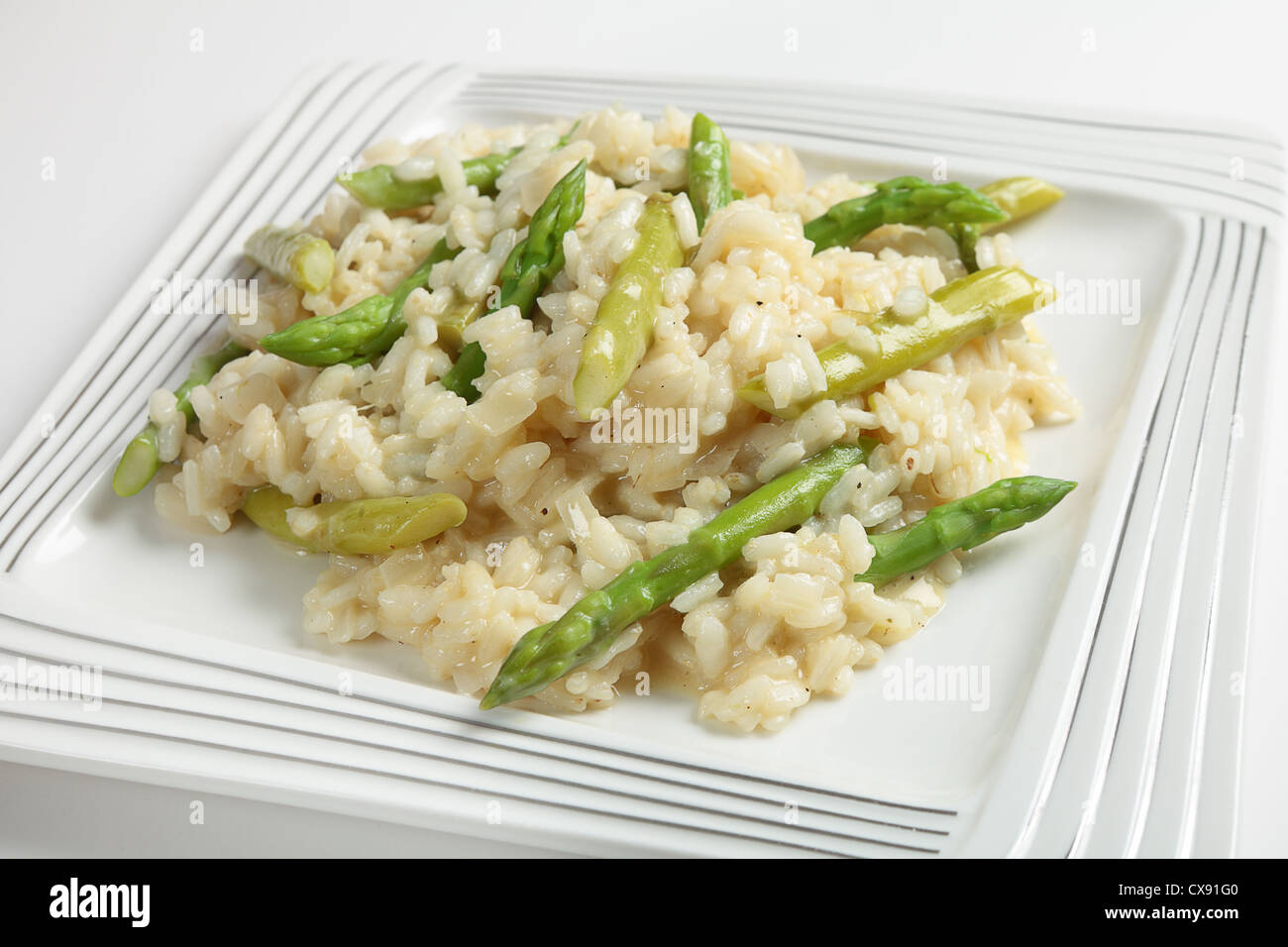 A plate of homemade asparagus risotto made with arborio rice, onion
