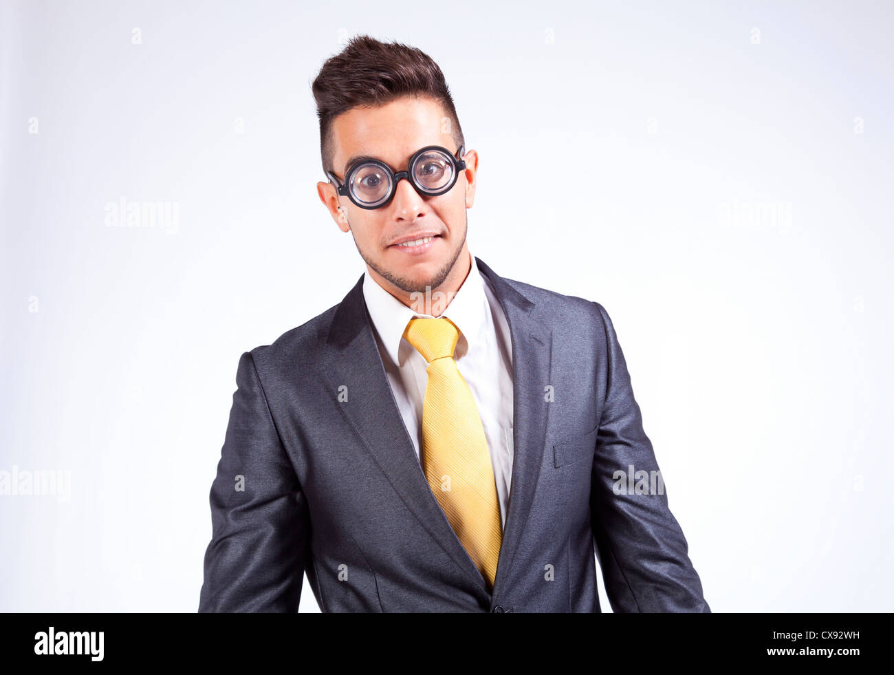 HAppy nerd businessman with funny glasses Stock Photo