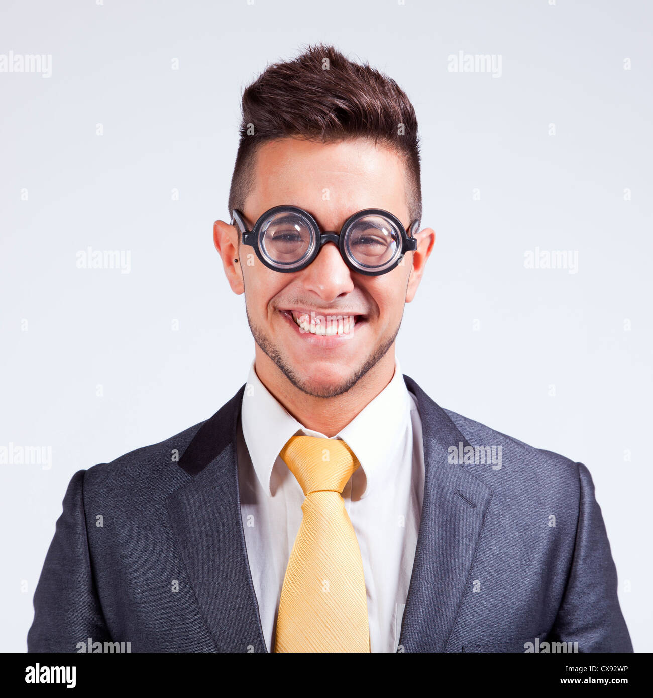 Happy nerd businessman with funny glasses Stock Photo