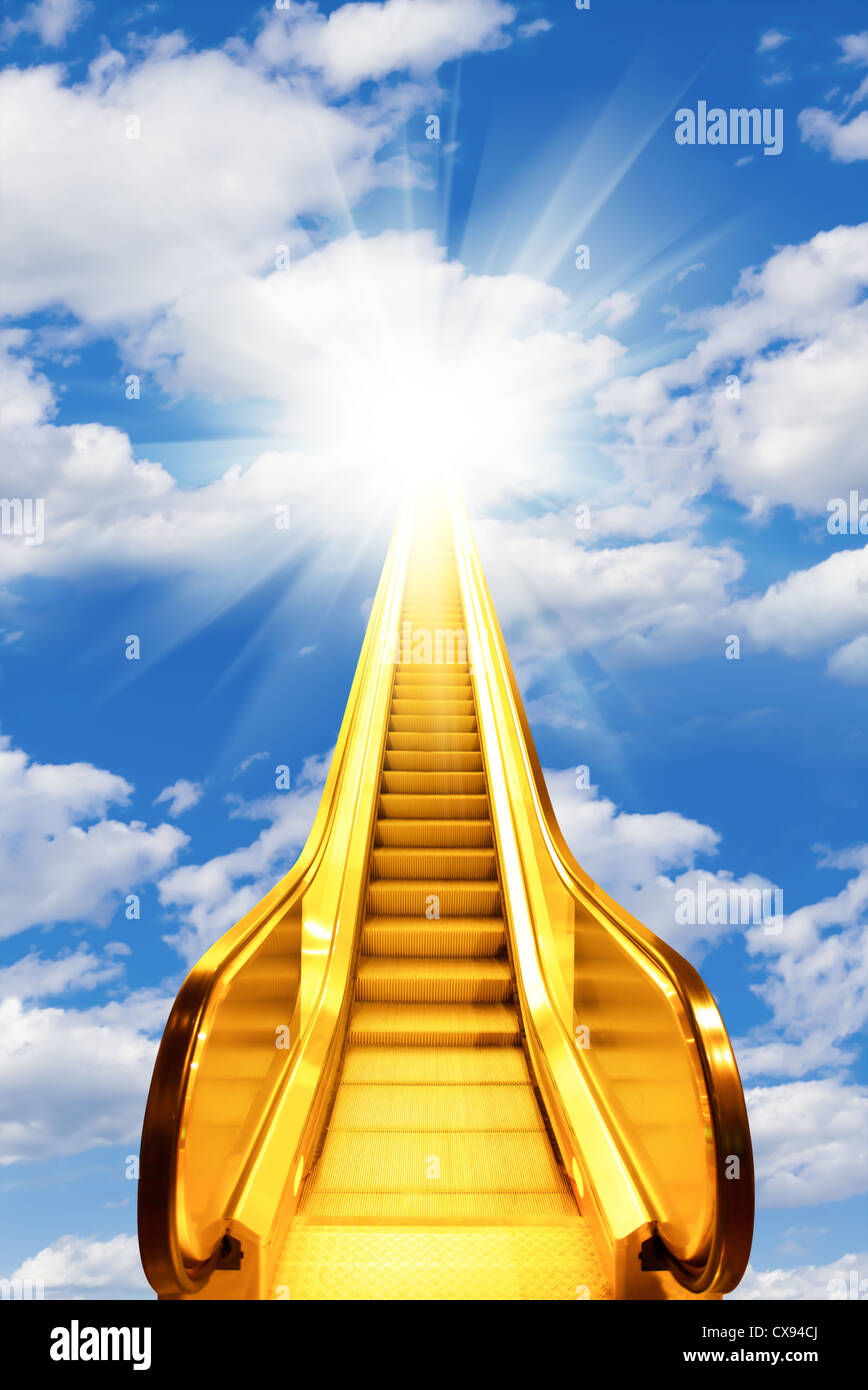 golden escalator stairs to the shine in the sky Stock Photo