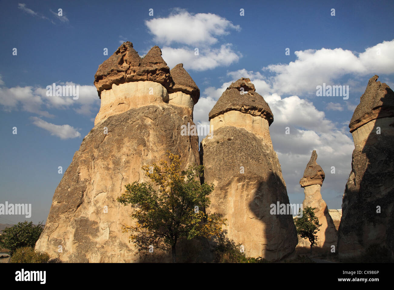 Cone-shaped chimneys in Cappadocia Stock Photo