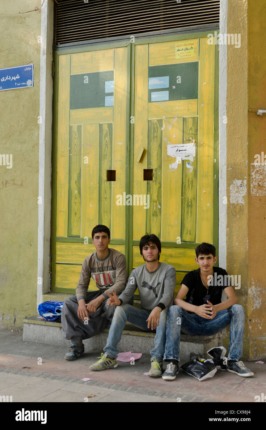 Young Iranian men hanging out in north of Tehran. Stock Photo
