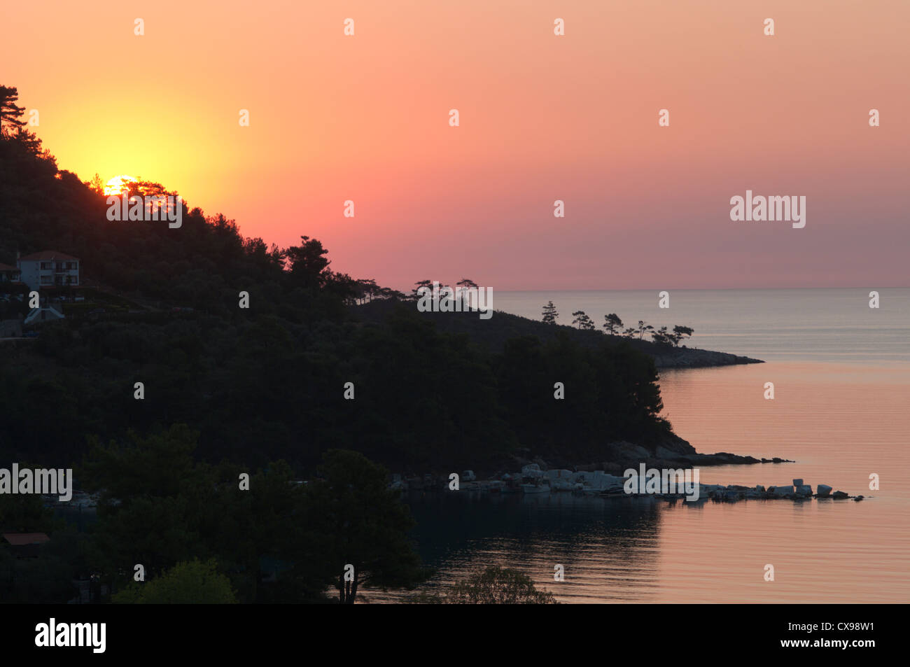 Thassos, Greece. Greek island. September. View from Golden beach (Chrisi Ammoudia/Skala Panagias) eastward to dawn sunrise. Stock Photo