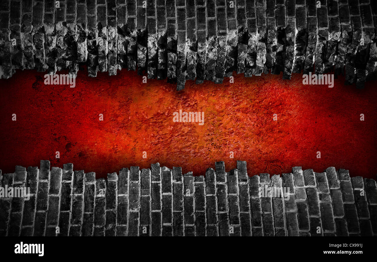 Broken black brick wall with large red hole Stock Photo