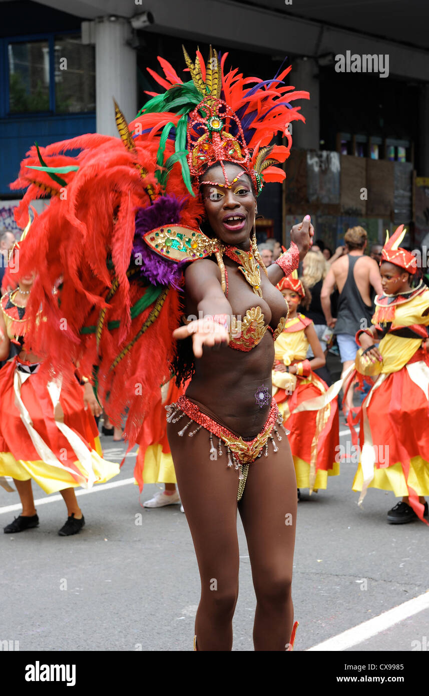 Woman dancing in the parade at Notting Hill Carnival on Monday 27th August 2012. Stock Photo