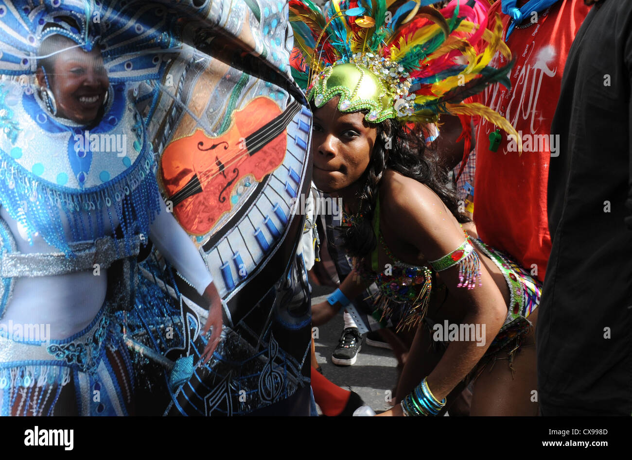 woman-in-colourful-costume-dancing-at-notting-hill-carnival-on-monday