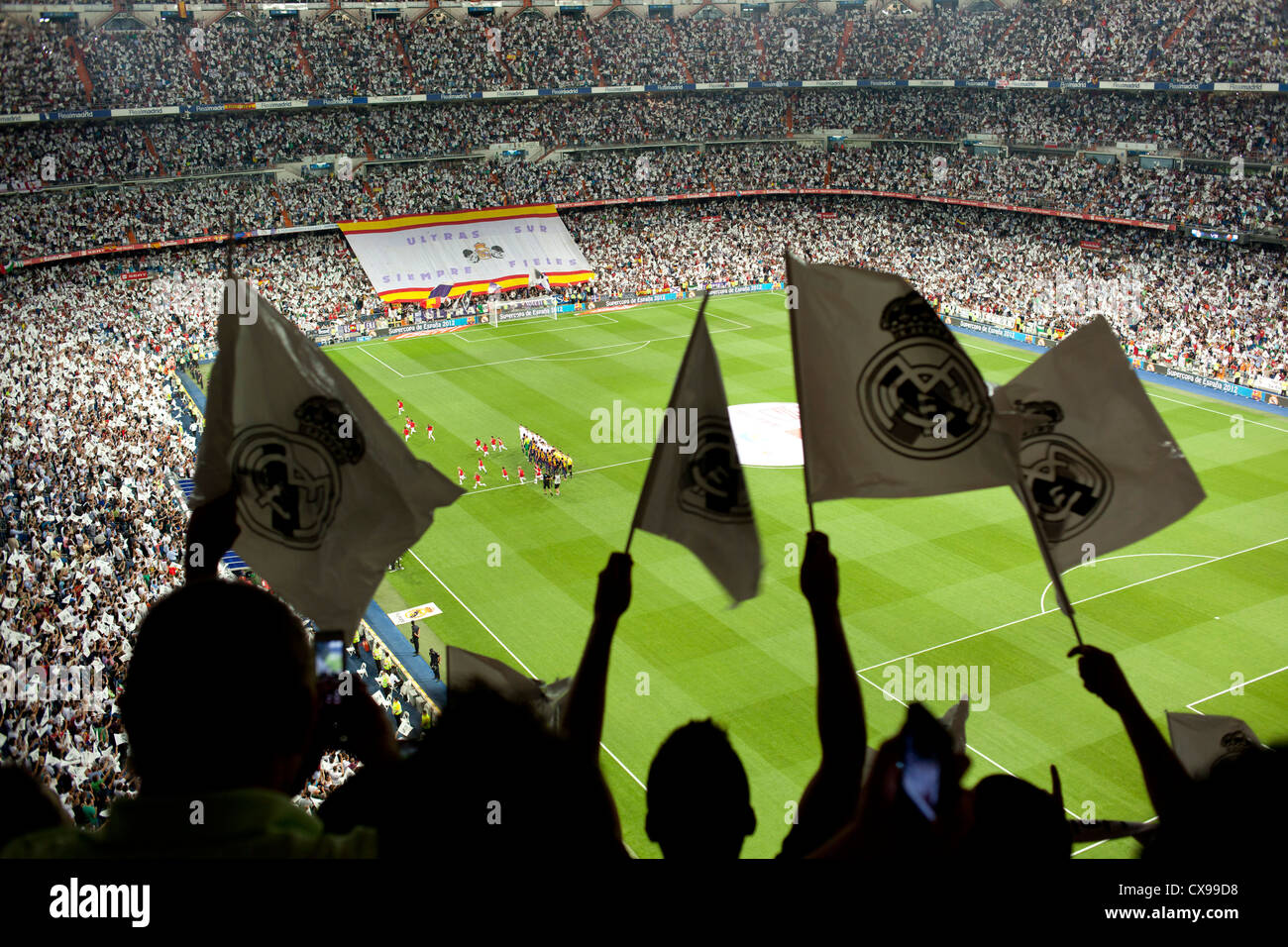 Eighty thousand people inside the Bernabeu stadium watching Real Madrid play Barcelona. Stock Photo