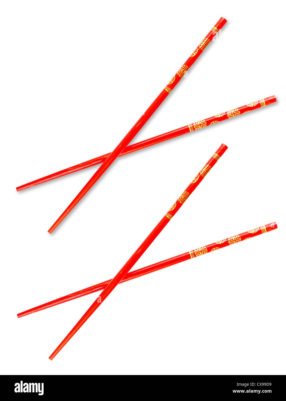 Pair of red chopsticks isolated on white with clipping path included Stock Photo