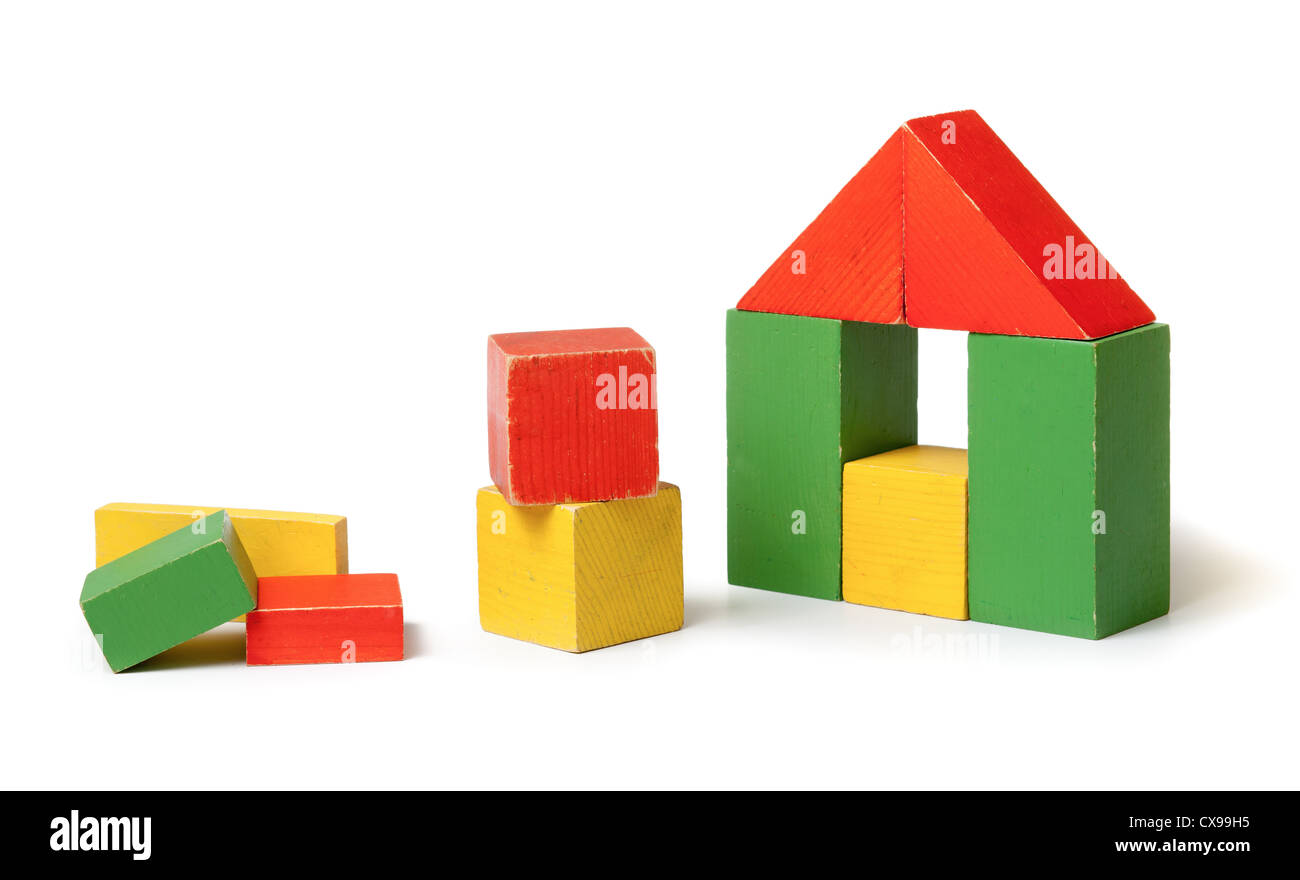 Simple house made from colorful wooden building blocks Stock Photo