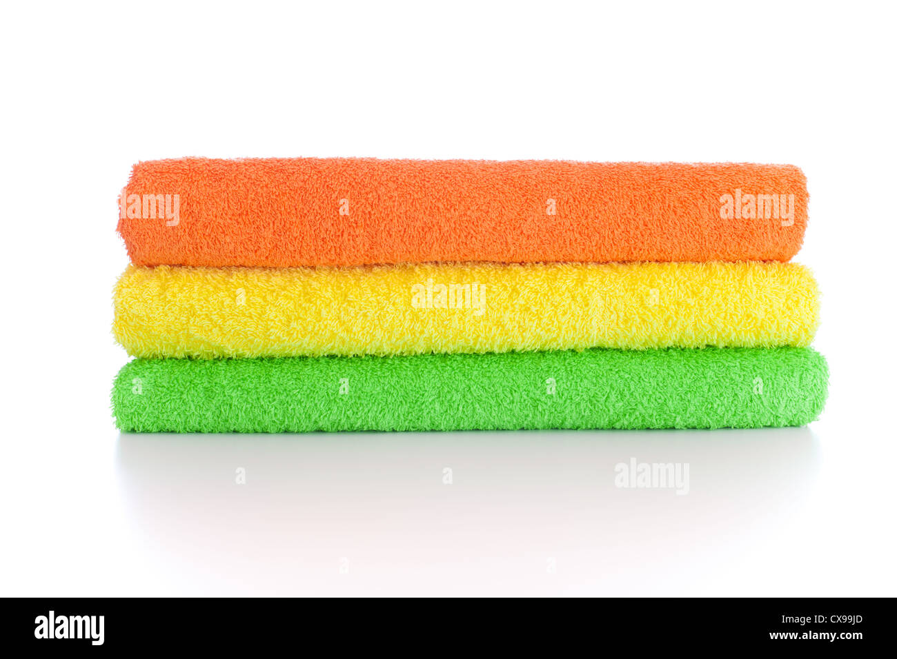 stack of fresh colorful towels isolated Stock Photo