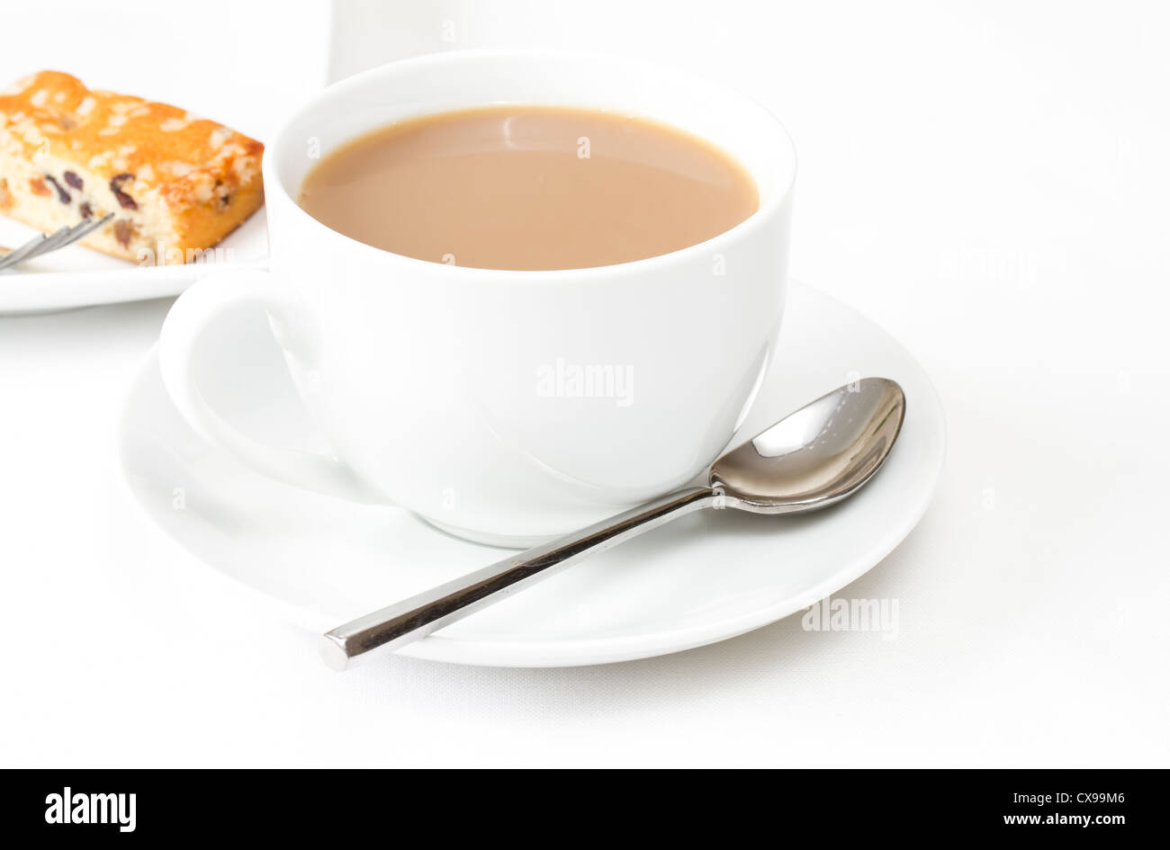 Cup of tea with a slice of fruit cake Stock Photo