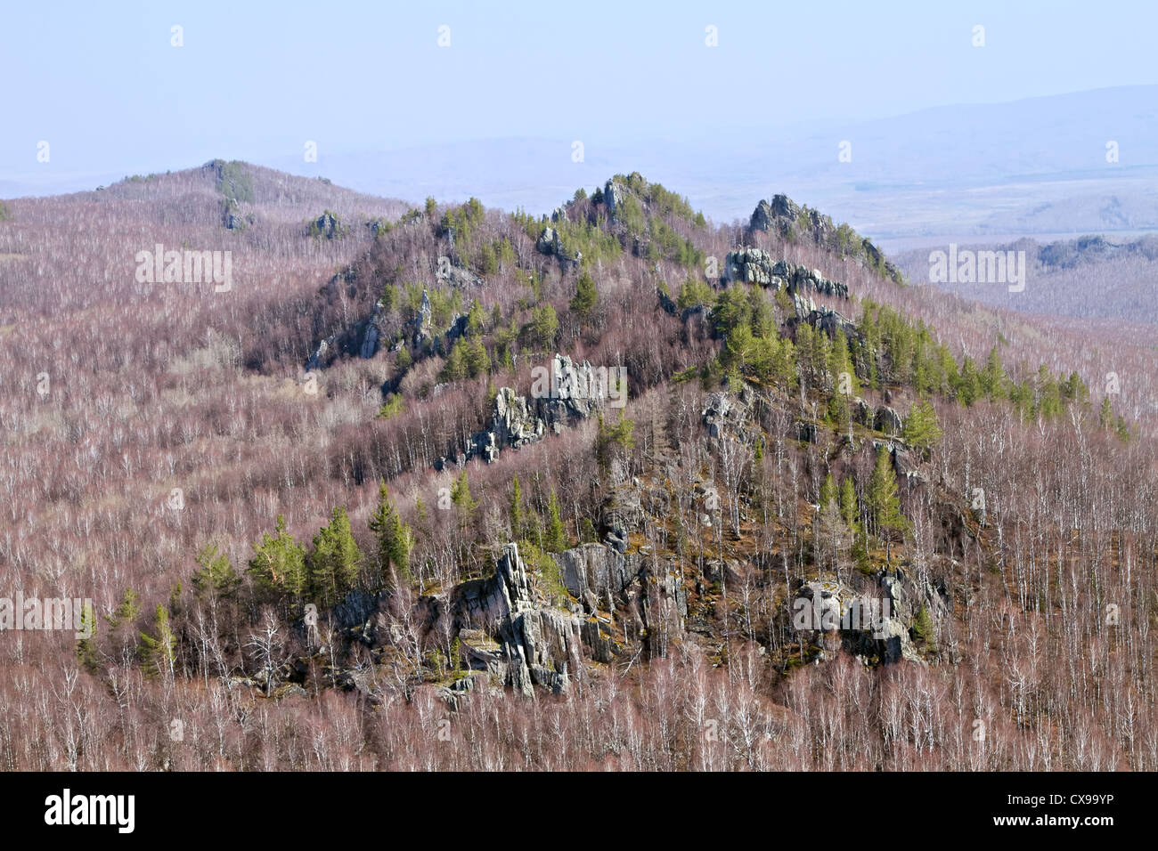 Rocky outliers in taiga forest.The ridge Alabiya. Southern Ural mountains. Bashkortostan. Russia. Stock Photo