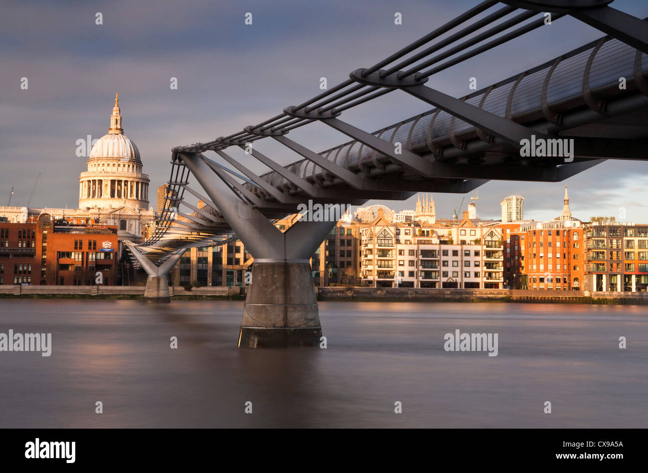 Millennium Bridge with St Paul's Cathedral at sunset in London, UK. Stock Photo