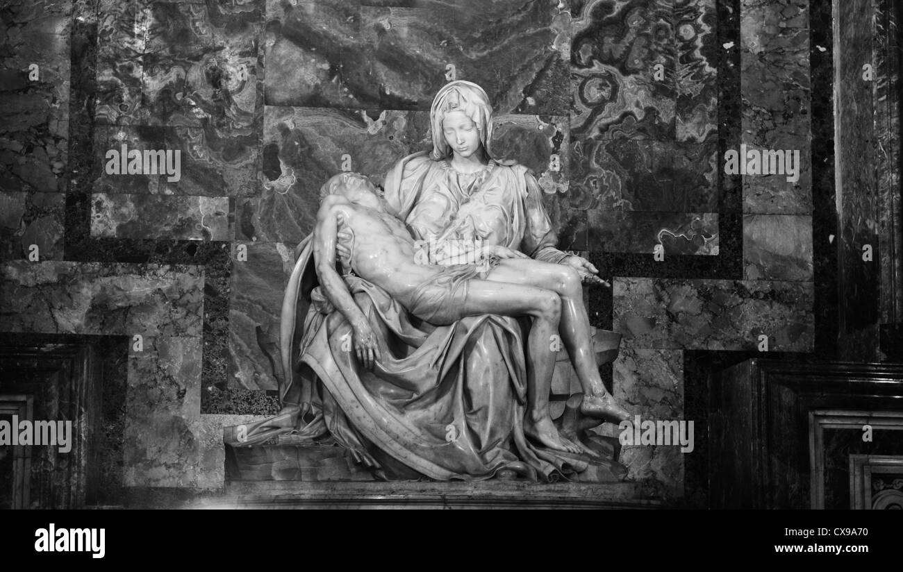Rome, Italy - 28 March, 2012: The famous La Pieta sculpture by Michelangelo inside San Pietro (Saint Peter) basilica in Vatican Stock Photo