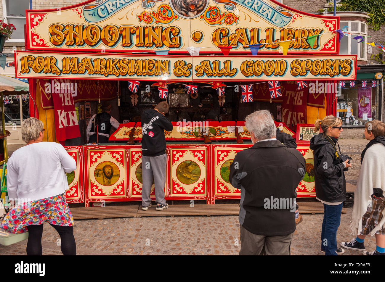A fairground shooting gallery at the 1940's weekend at Leyburn in North Yorkshire, England, Britain, Uk Stock Photo