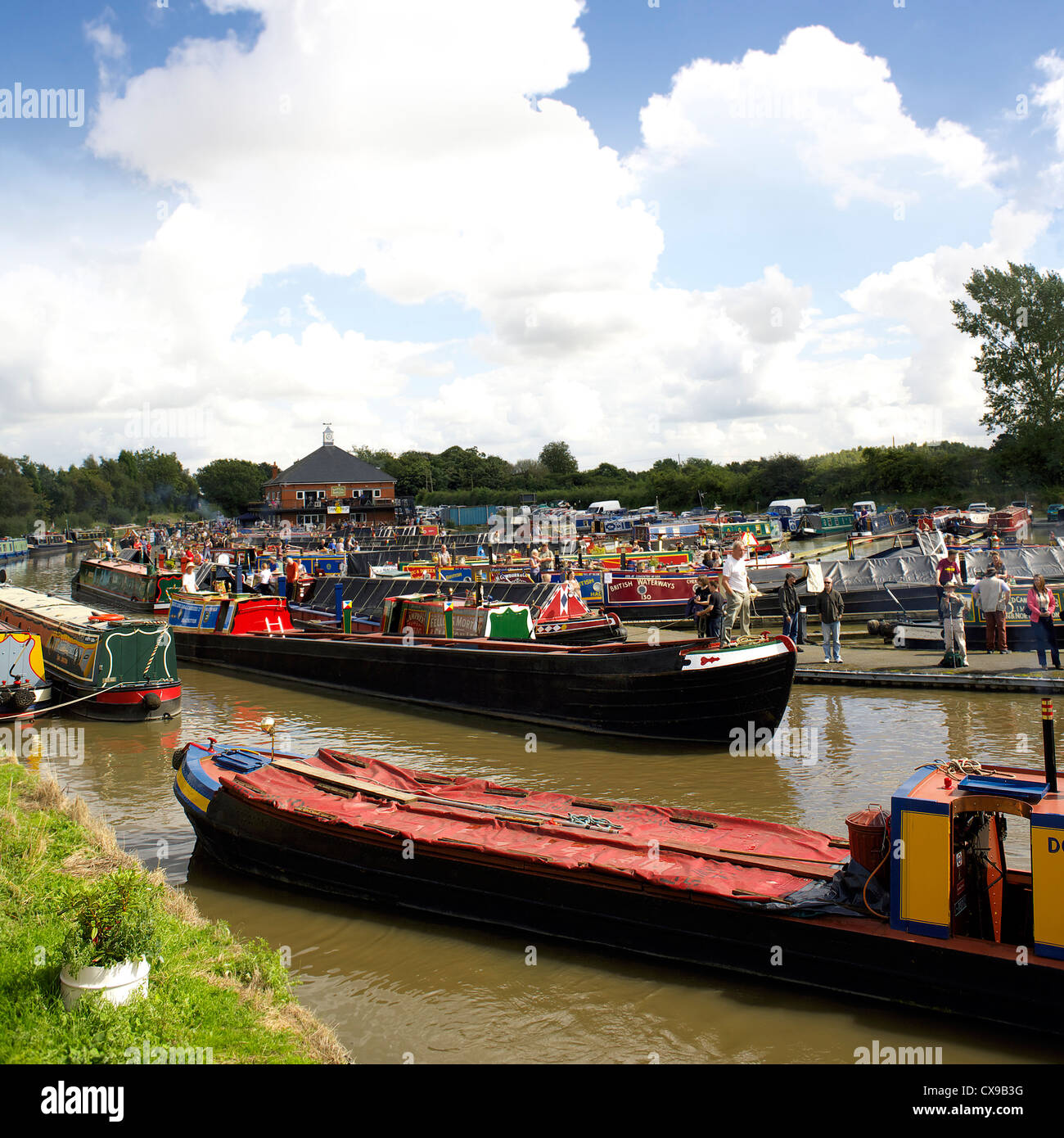 Colourful narrowboats at Alvecote Marina, Coventry Canal, near Tamworth, Staffordshire, England, UK, during the 2012 Alvecote Stock Photo