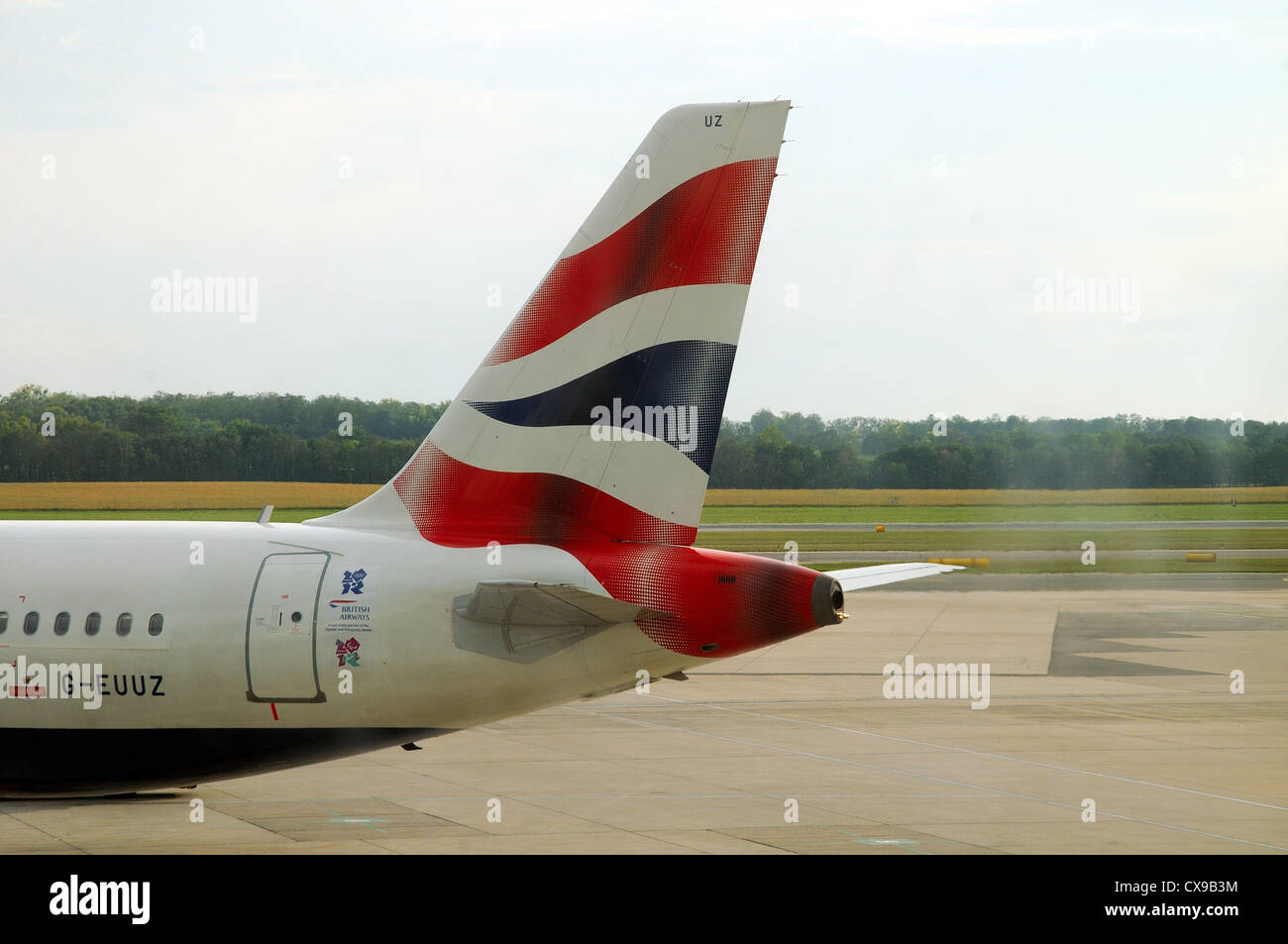 British Airways logo on tail plane of passenger aircraft Airbus A 320 Stock Photo