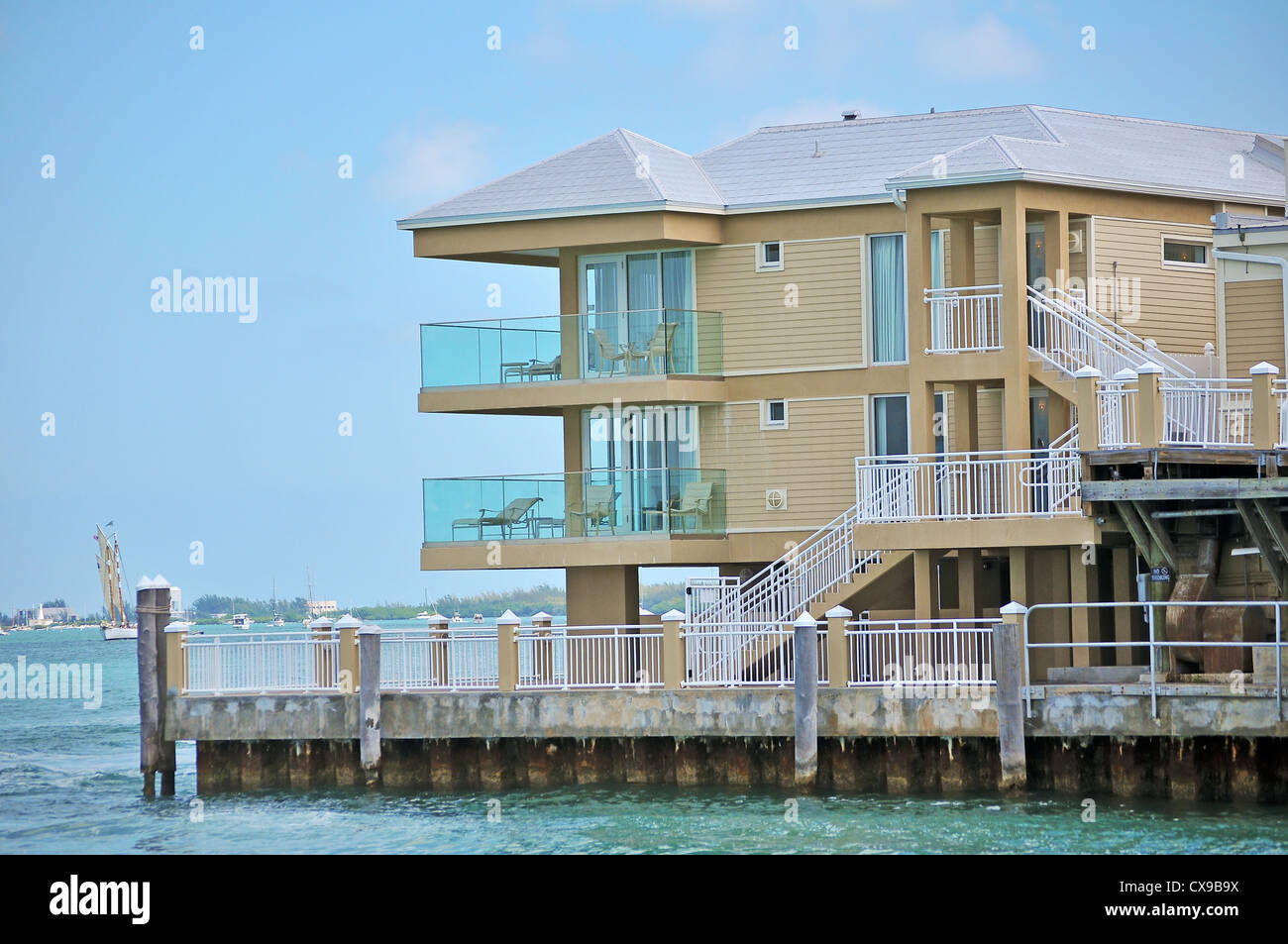 A large modern style new home along the ocean. Stock Photo