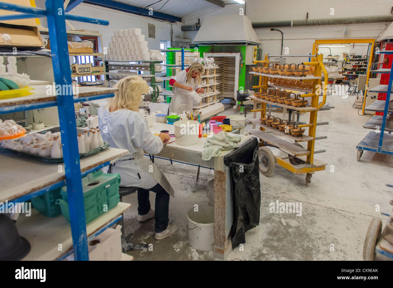 Two women making novelty teapots in the teapottery in Leyburn