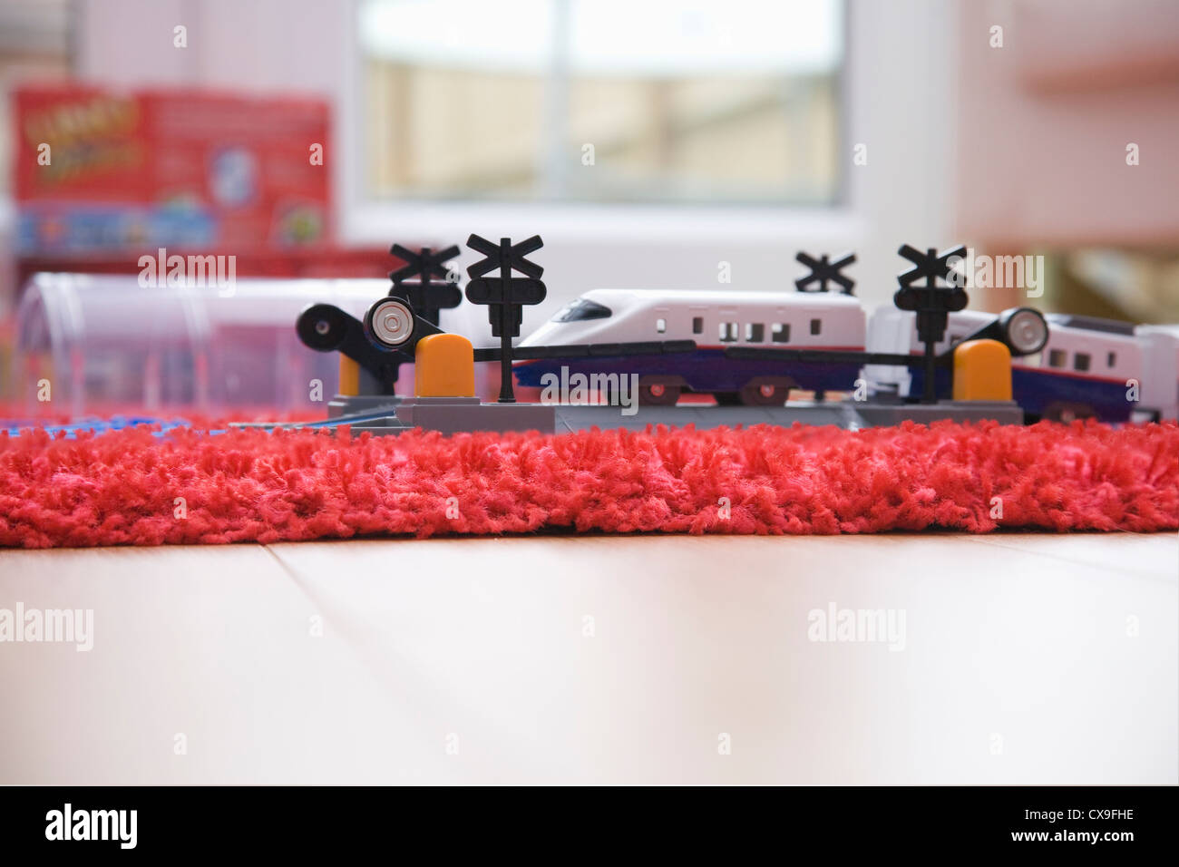 plastic toy train set in a childrens playroom Stock Photo Alamy
