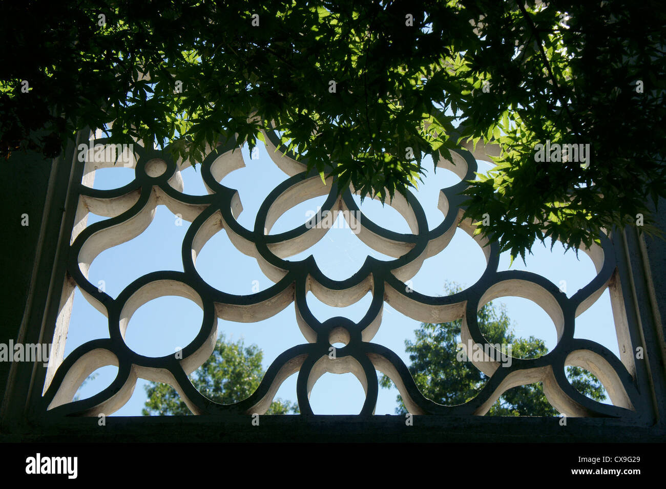 Concrete Chinese lattice window in Dr. Sun Yat-Sen Park, Chinatown, Vancouver, British Columbia, Canada Stock Photo