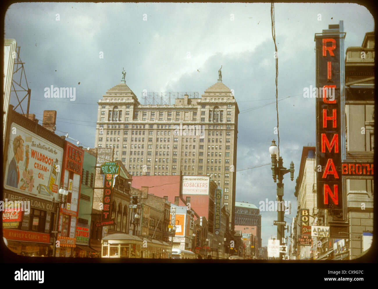 New York city street scene 1949 1940s color kodachrome richman brothers signage sign wildroot cream oil north division billboard Stock Photo