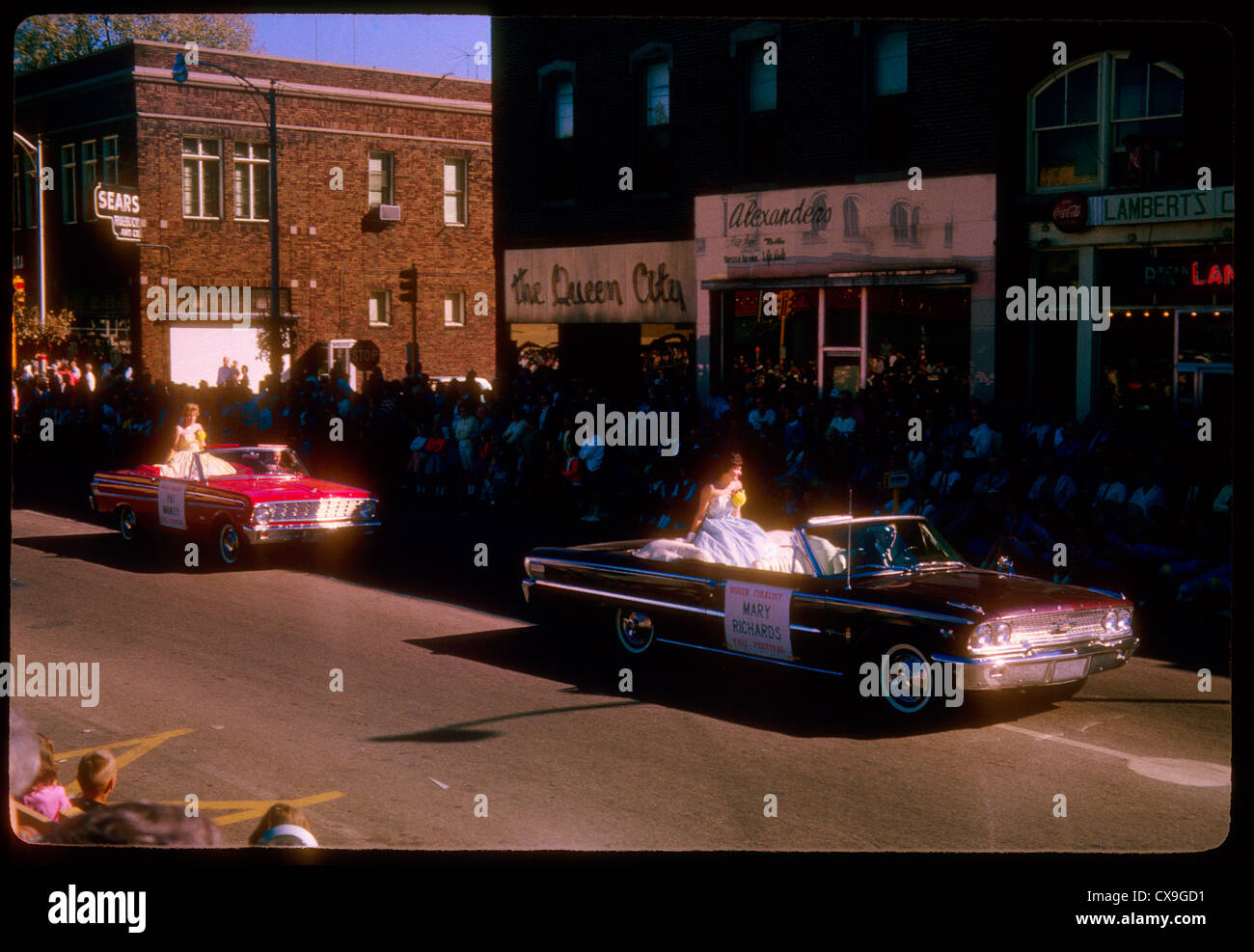 martinsville indiana fall festival parade queen candidates sitting in cars passing chevlolet americana Stock Photo