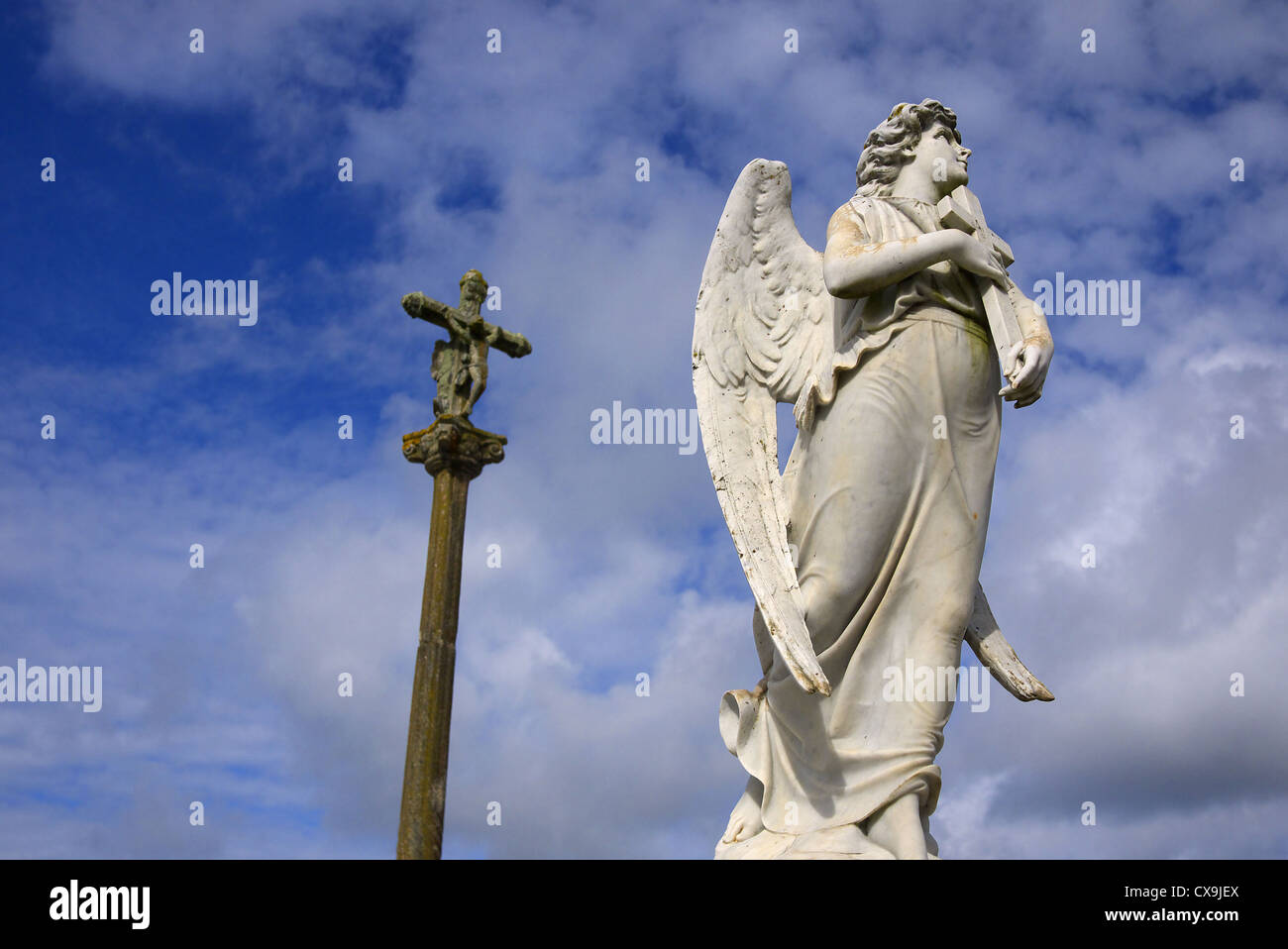Angel with a cross in a cemetery near Cee in Galicia, Spain. Stock Photo