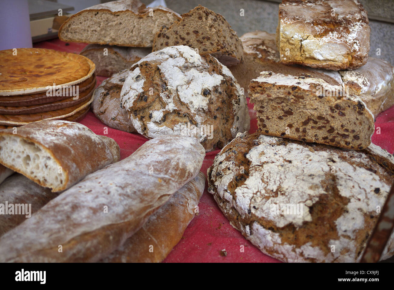 Home made bread on sale at a market in Spain. Stock Photo