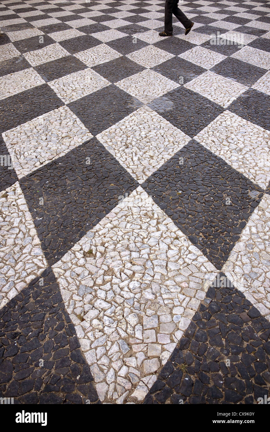 Black and white chequered paving in Tomar, Portugal. Stock Photo