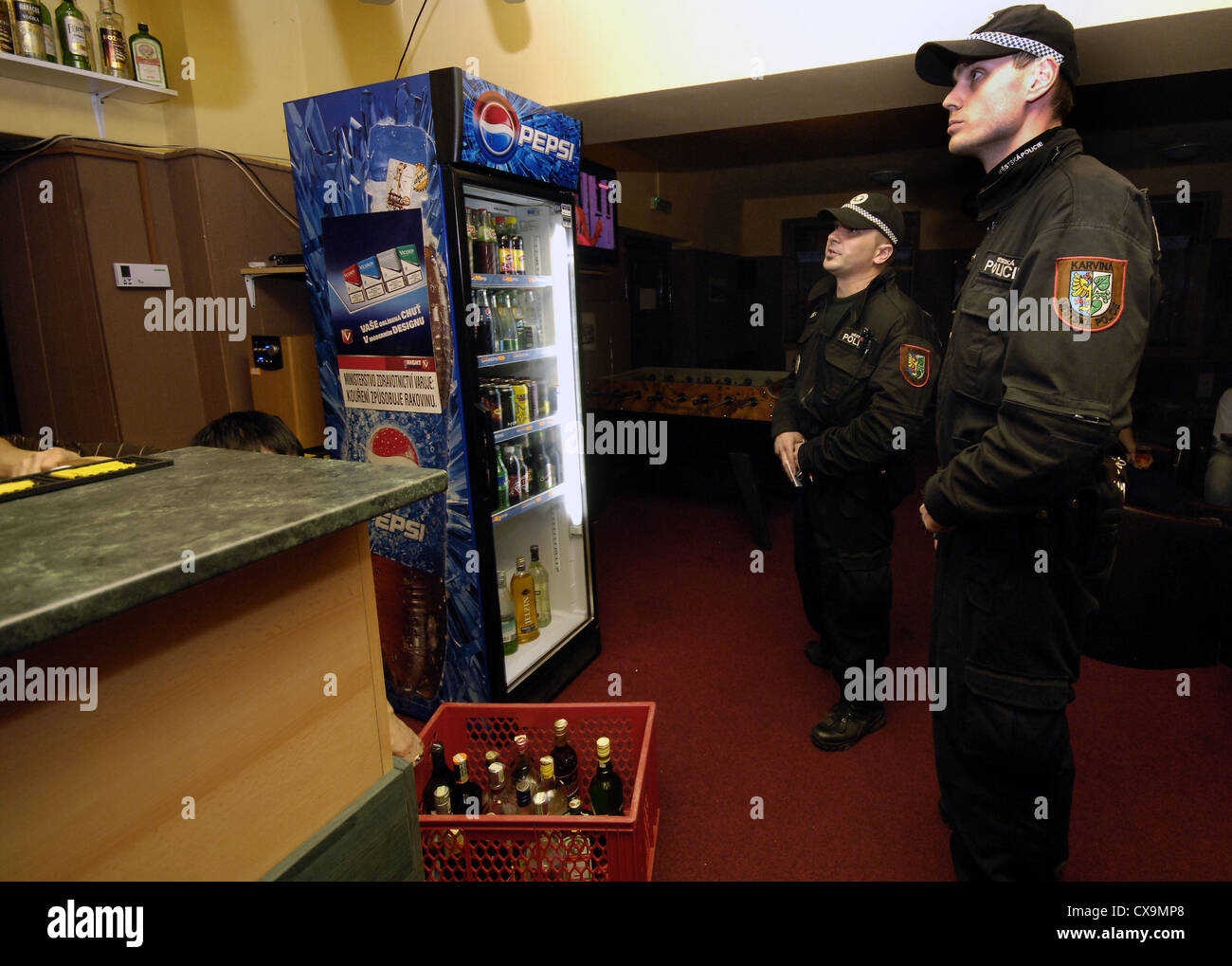 policemen, restaurant, pub, prohibition,  methyl alcohol, Complete ban of hard alcohol in the Czech Republic Stock Photo
